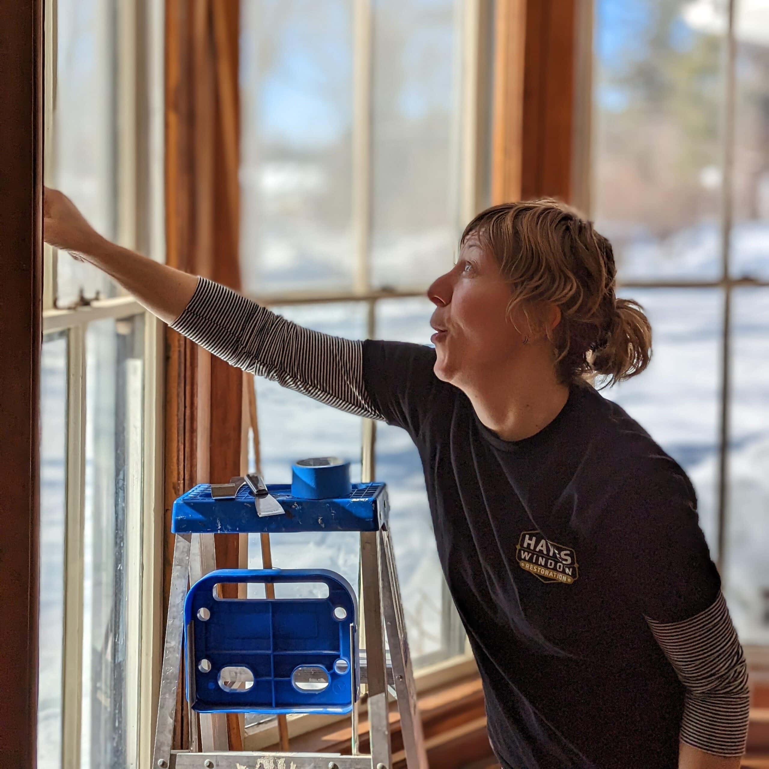 Refurbishing historic wooden windows during restoration process by Hayes Window Restoration.