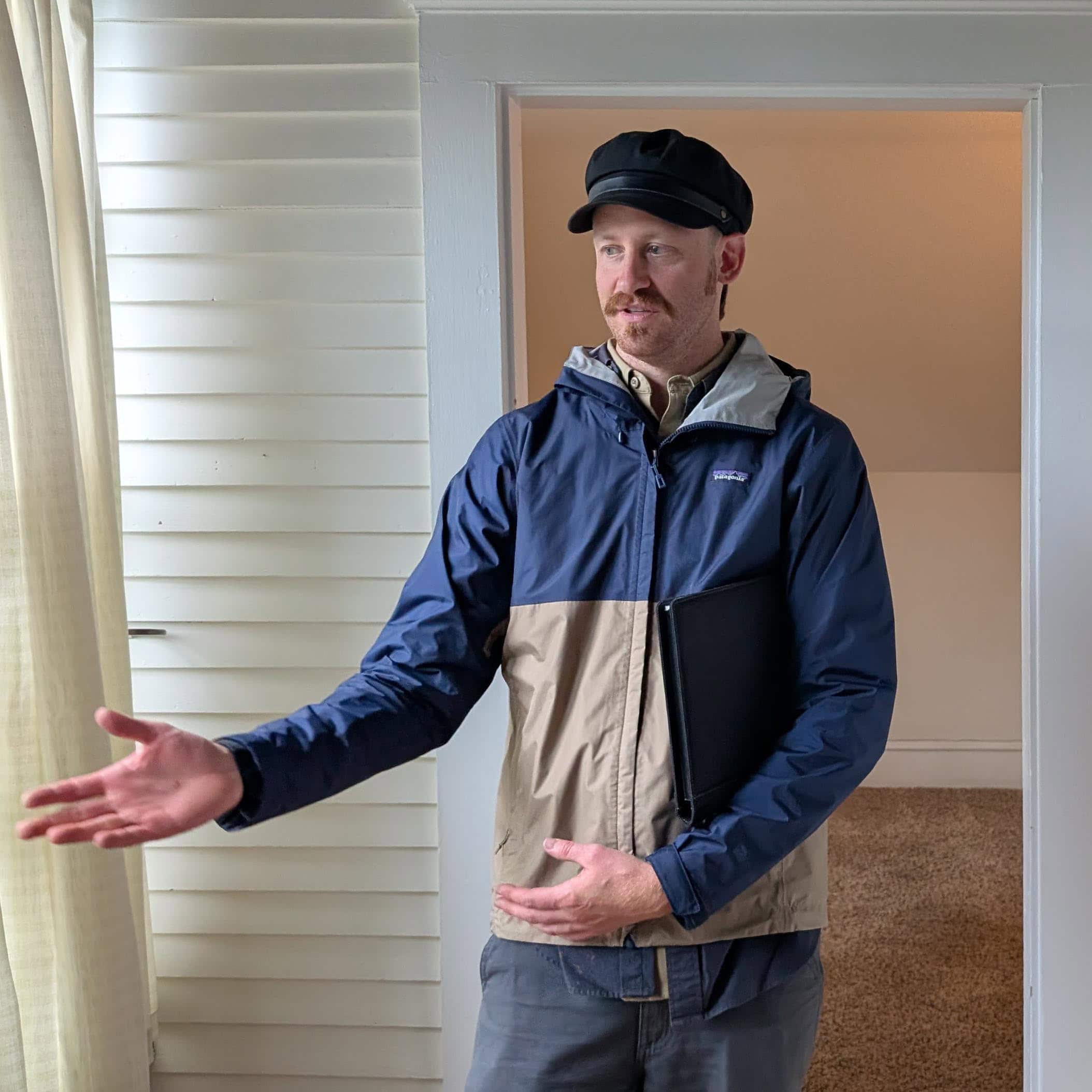Window restoration expert demonstrating restoration process at home.